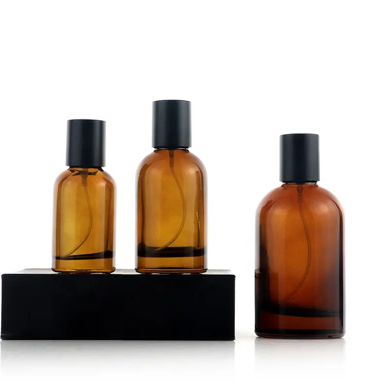 New Luxury Cylinder Shape Amber Spray Glass Bottle 30ml 50ml 100ml Cosmetic Amber Perfume Bottle with black lid