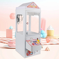 Mini machine à griffes personnalisée 110V pour attraper bonbons et jouets, idéale pour les fêtes foraines et centres commerciaux