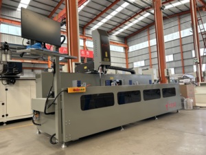 Machine de fraisage et de perçage automatique de profilés en aluminium à double tête de haute précision pour le traitement des portes et fenêtres en aluminium CNC - Product Image 1