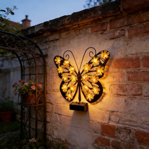 Nuova Lampada <span class=keywords><strong>Solare</strong></span> da Esterno <span class=keywords><strong>a</strong></span> <span class=keywords><strong>LED</strong></span> Nera in Metallo con Grado di Protezione IP65, <span class=keywords><strong>a</strong></span> Forma di Farfalla, <span class=keywords><strong>per</strong></span> Paesaggi e Cortili, Montaggio <span class=keywords><strong>a</strong></span> Parete - Product Image 1