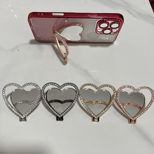 Soporte de Teléfono de Lujo con Diamantes y Espejo, 2 en 1, Plegable, con Forma de Corazón, Accesorios para Teléfono - Product Image 1