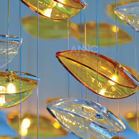 Lustre en verre et plumes de luxe ANNO pour projet d'escalier duplex