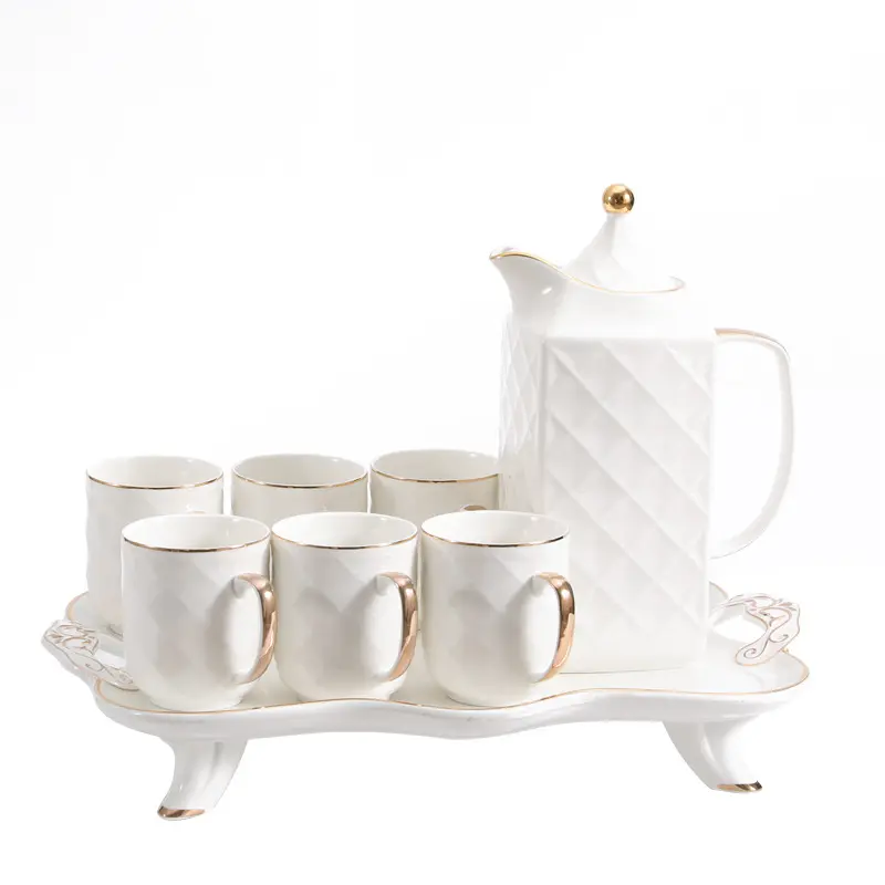 Exquisito diseño dorado y blanco, regalo de boda, taza de té y café, platillos, juegos de café, tetera de alta calidad, olla y Taza de cerámica personalizadas