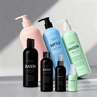 Vente en gros emballage de bouteille de shampoing personnalisé avec logo en plastique vide rond noir PE-HD bouteilles de shampoing et d'après-shampoing à pompe