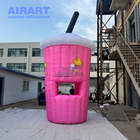 Tente gonflable en forme de mangue pour stand de jus en plein air, idéale pour la publicité et la décoration.