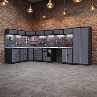 Garage en acier en forme de L personnalisable OEM à 10 modules avec îlot de travail, armoire d'angle, panneau perforé et éclairage LED