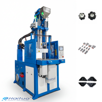 Machine de moulage par injection verticale pour connecteurs automobiles étanches avec serrage stable