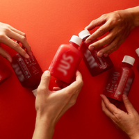 Bouteilles de boisson en plastique portables de qualité alimentaire, personnalisées avec un logo minimaliste, pour les boutiques de jus pressés à froid