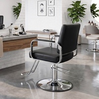 Fauteuil de salon élégant avec base ronde chromée, repose-pieds et dossier inclinable, chaise de barbier hydraulique