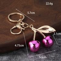 Porte-clés élégant en métal cerise, étanche, tendance, breloque de sac à main, pendentif stylé pour sac à main ou clé de voiture, accessoire décoratif