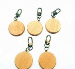 โปรโมชั่นขายส่งจากโรงงาน พวงกุญแจไม้ทรงกลมขนาดเล็ก ดีไซน์สร้างสรรค์ สำหรับสลักชื่อ - Product Image 3