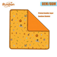 Couverture en bambou double couche personnalisée OEM ODM, imprimée sur le devant et unie au dos, douce et respirante, pour lit de bébé