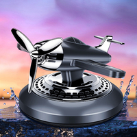 Rafraîchisseur d'air solaire pour voiture Rotation automatique Diffuseur d'aromathérapie Hélice Avion de style Décoration intérieure automatique Parfum