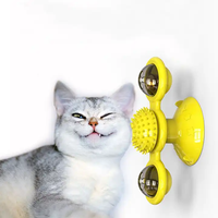Vente en gros Jouet interactif multifonctionnel pour chat Ventouse de toilettage Molaire en caoutchouc Boule roulante pour chat