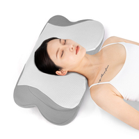 Oreiller ergonomique en mousse à mémoire de forme pour l'alignement de la colonne vertébrale et la traction cervicale