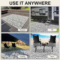 Les fabricants fournissent des tapis d'extérieur tissés en PP à double couche pour jardin, écran solaire, tapis anti-âge pour VR, hauteur de pile en peluche
