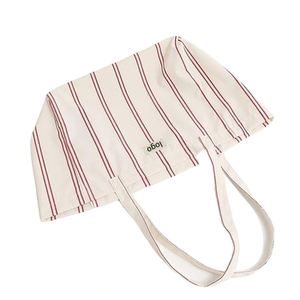 Grand sac fourre-tout en toile rayée avec poche zippée, sac à bandoulière léger et pliable pour femmes et hommes - Product Image 4