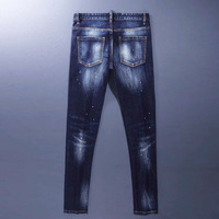 Pantalon crayon en jean pour homme, style streetwear euro-américain, en coton, bleu vintage moyen, finition effet peinture délavée au printemps