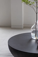 Table basse ronde noire minimaliste scandinave moderne en béton