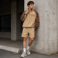 Ensemble de survêtement IKDEER personnalisé à blocs de couleurs, haut à demi-zip et short à cordon de serrage pour les loisirs en plein air et les activités quotidiennes