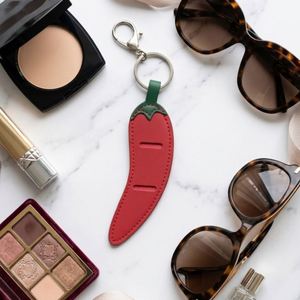 Hot Sale Creative PU Leather Portable Durable Eyeglass Clip Keychain Decorative Sunglasses Holder New <b>Bag</b> <b>Charm</b> Women Couple - Product Image 3