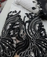 Dentelle française pour femmes, collection août 2026, avec matériaux brillants et perles faites à la main