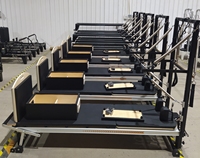 Reformer de Pilates en aluminium avec tour demi-trapèze, garantie de 5 ans, lit d'entraînement Pilates personnalisé pour le renforcement du tronc