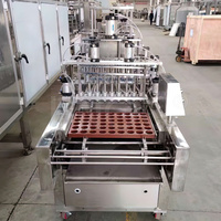 HNOC Economisez le coût de la main-d 'œuvre Machine entièrement automatique pour fabriquer des gâteaux Machine de dépôt de pâte à muffins pour gâteaux