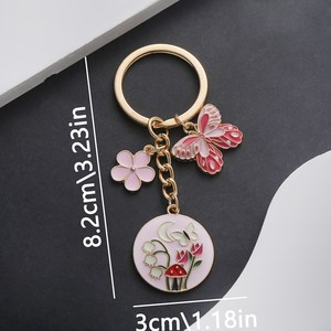1 llavero de flor de mariposa esmaltada bonita, llavero de jardín de aleación, para llaves de coche, mochilas, carteras - Product Image 2