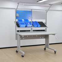 Table d'assemblage ESD réglable conçue pour la fabrication électronique avec un cadre en acier robuste pour un fonctionnement stable OEM