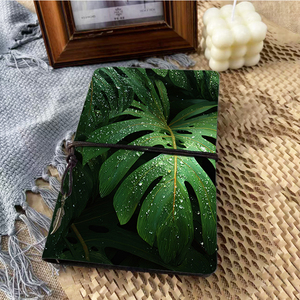 Cadeau d'événement industriel pour cahier A6 artisanal, idéal pour les notes de séminaire et l'analyse des concurrents avec des feuilles de Monstera avec de l'eau - Product Image 2