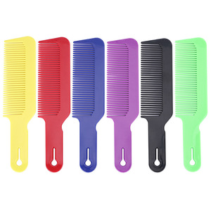 Grand peigne à cheveux en plastique pour usage en salon, apparence élégante, disponible en plusieurs couleurs - Product Image 1