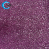 Tissu tricoté jersey 95% polyester 5% élasthanne extensible dans les quatre sens avec points métalliques dorés estampés pour robes, maillots de bain et vêtements de sport