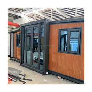 Maison conteneur contemporaine <span class=keywords><strong>de</strong></span> 40 pieds avec extension à double aile, construction en panneaux sandwich pour aménagement <span class=keywords><strong>de</strong></span> dortoir collectif pour 8 à 12 <span class=keywords><strong>personnes</strong></span> - Product Image 1