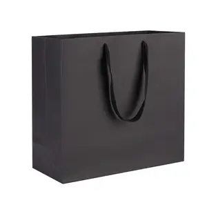 Özel baskılı kendi Logo beyaz siyah Kraft hediye zanaat kağıt alışveriş torbası kolları ile