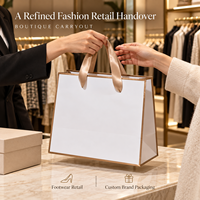 Sacs en papier 150 GSM avec poignées en ruban pour boutiques de vêtements, emballage personnalisé pour vêtements, commandes en gros pour marques de mode