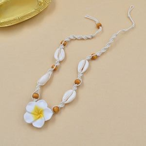 Nouveau design naturel coquille de mer cauri tissé tour de cou mode Hawaii plage Plumeria fleurs perles de bois tressé déclaration collier - Product Image 5