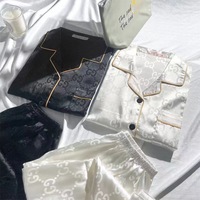 Pyjama en satin pour femmes tendance et très vendu, printemps et automne, nouveau tissu en soie glacée jacquard, ensemble de vêtements de maison à manches longues et fines