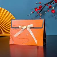 Sac cadeau en papier de luxe écologique durable personnalisé avec poignées torsadées et ruban pour bijoux, montres, lunettes, emballage de boutique