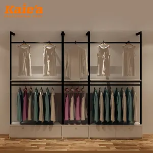 Décoration de boutique de vêtements unique sur mesure Présentoir de magasin de vêtements pour femmes Design moderne pour magasin de vêtements