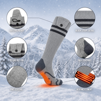 Chaussettes chauffantes électriques tricotées respirantes antidérapantes unisexes personnalisées avec batterie rechargeable pour le ski et le snowboard en hiver