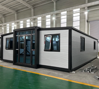 Maison préfabriquée pliable et extensible à double aile de 20 et 40 pieds, avec panneaux sandwich isolés en PU, pour entrepôt moderne, salle de bain, cuisine, camping