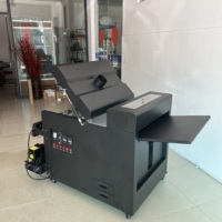 Machine compacte de séchage et de pulvérisation de poudre DTF rouleau à rouleau 24 pouces avec ventilateur de refroidissement par air et configuration double tension 110V 220V