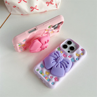 Coque de téléphone portable en silicone avec support romantique motif nœud de dessin animé pour iPhone 17 16 15 Pro Max, support papillon mignon, coque arrière en caoutchouc
