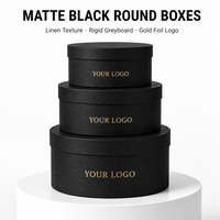 Boîtes rondes noires mates avec texture lin, carton rigide gris, logo en feuille d'or, boîtes cadeaux imbriquées pour fleurs et bijoux