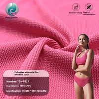 Tejido de punto jacquard de una sola cara teñido con hilo, 100% poliéster elástico y arrugado para trajes de baño de mujer