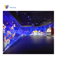 Projecteur laser, salle de projection immersive, projection murale interactive