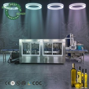 Ligne de remplissage rotative de verre pour huile de soja et de sésame, 3000-25000 BPH, avec détection de poids et kit de configuration GMP - Product Image 1
