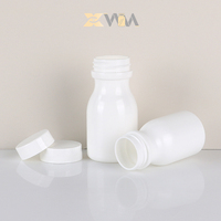 Conteneur rond en HDPE blanc de 50 ml et 60 ml, flacon pour pilules de soins de santé avec bouchon à vis