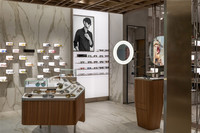 Présentoir mural de lunettes de mode moderne haut de gamme pour vitrine de magasin d'optique